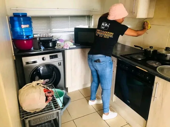 Team working on kitchen surface restoration